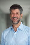 a man wearing a blue shirt